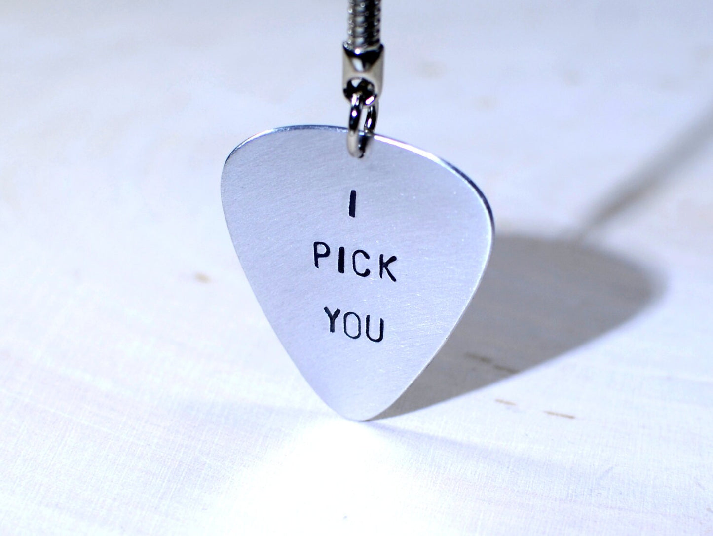 Sterling silver guitar pick key chain with I pick you