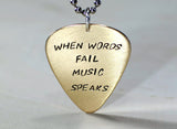 Bronze guitar pick pendant handmade with When words fail music speaks, NiciArt 