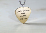 Bronze guitar pick pendant handmade with When words fail music speaks, NiciArt 