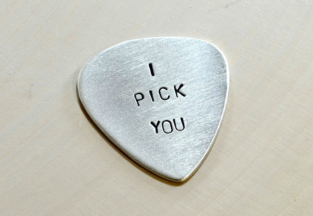Sterling silver guitar pick with I pick you
