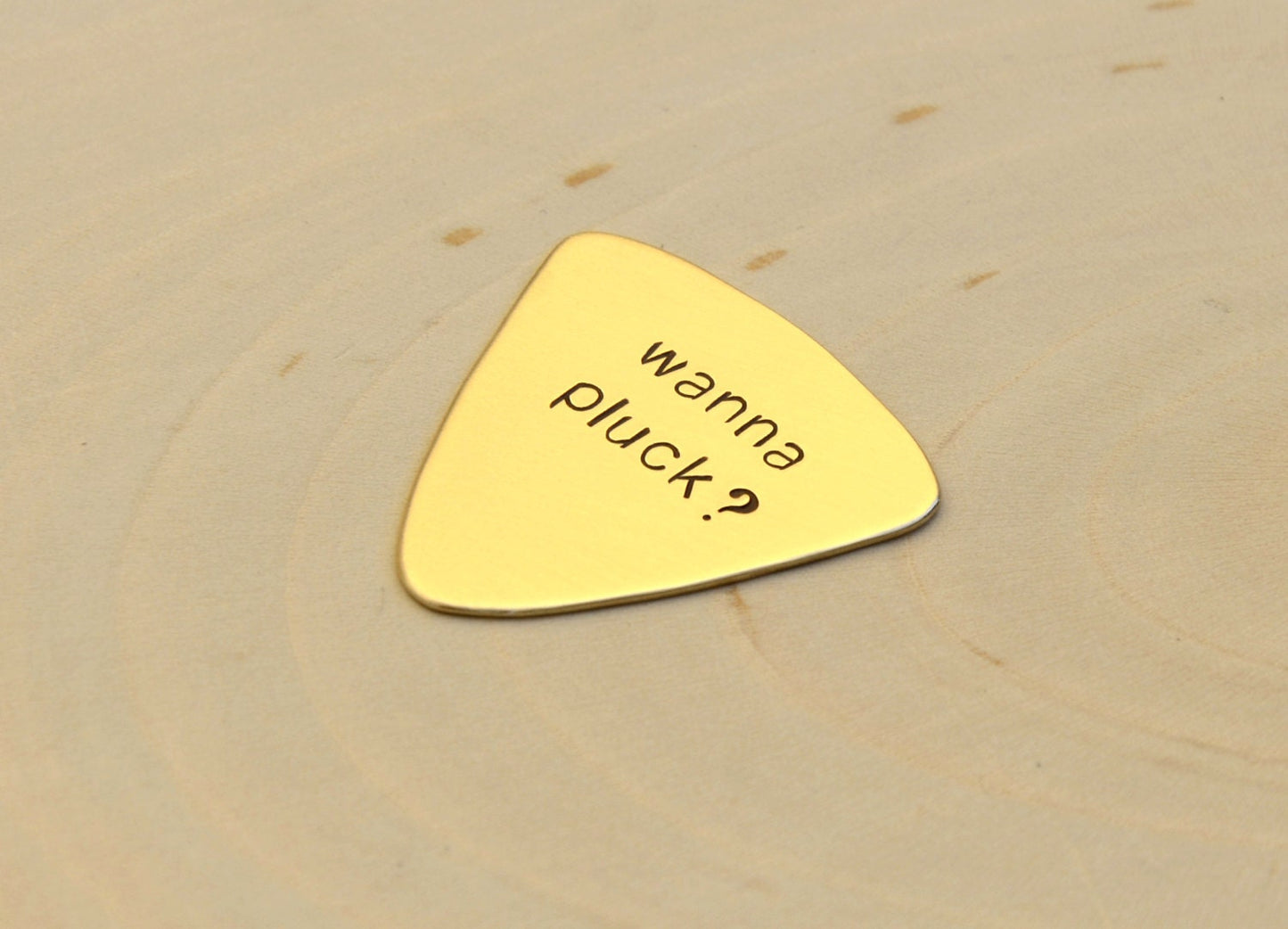 Wanna Pluck bronze triangular style guitar pick