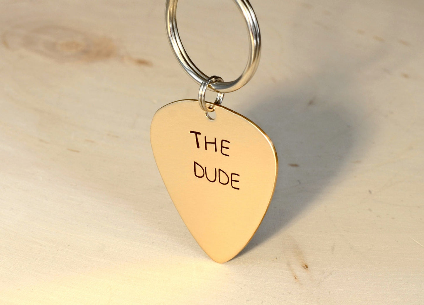 Customized bronze guitar pick keychain