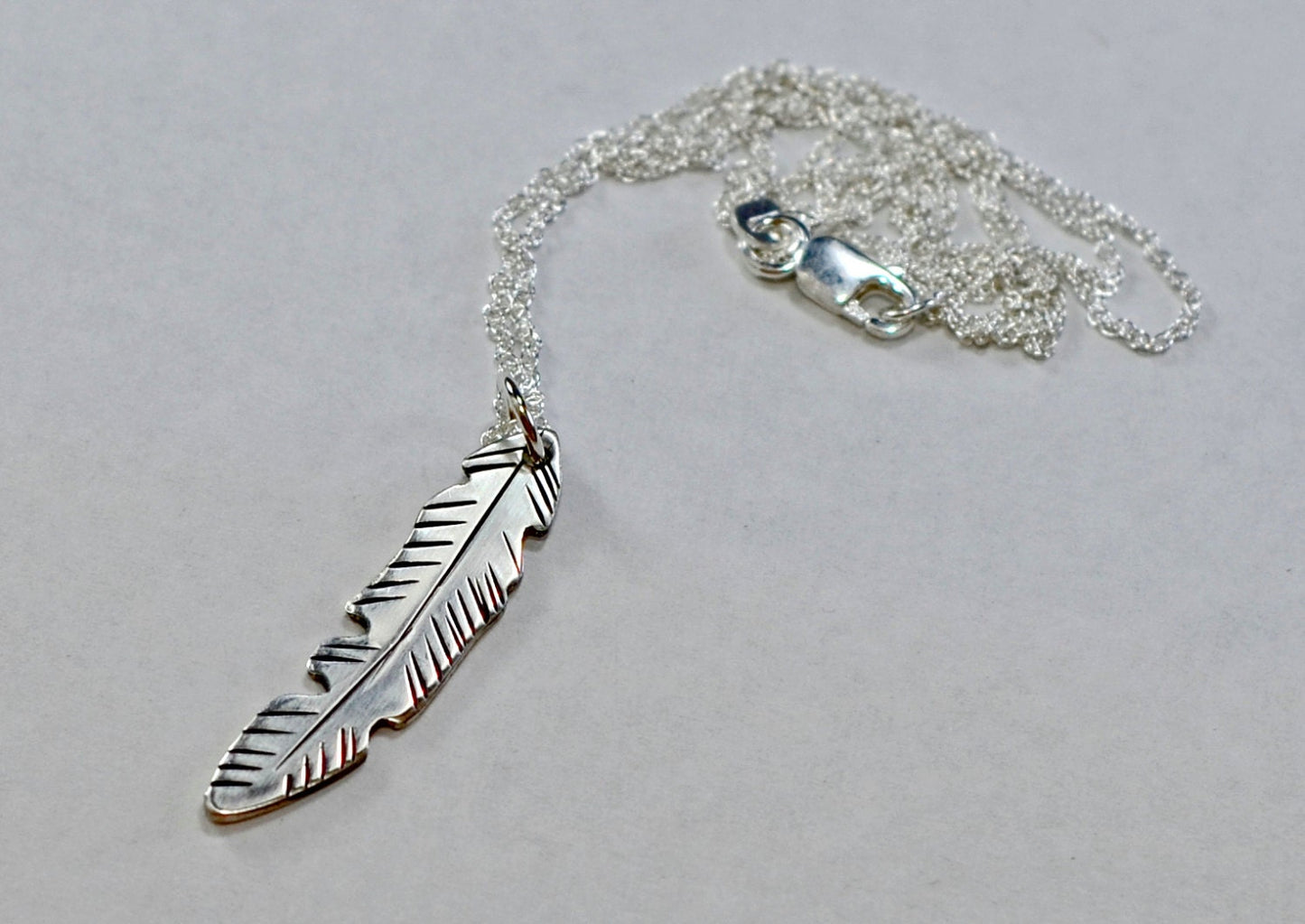 Sterling silver feather necklace