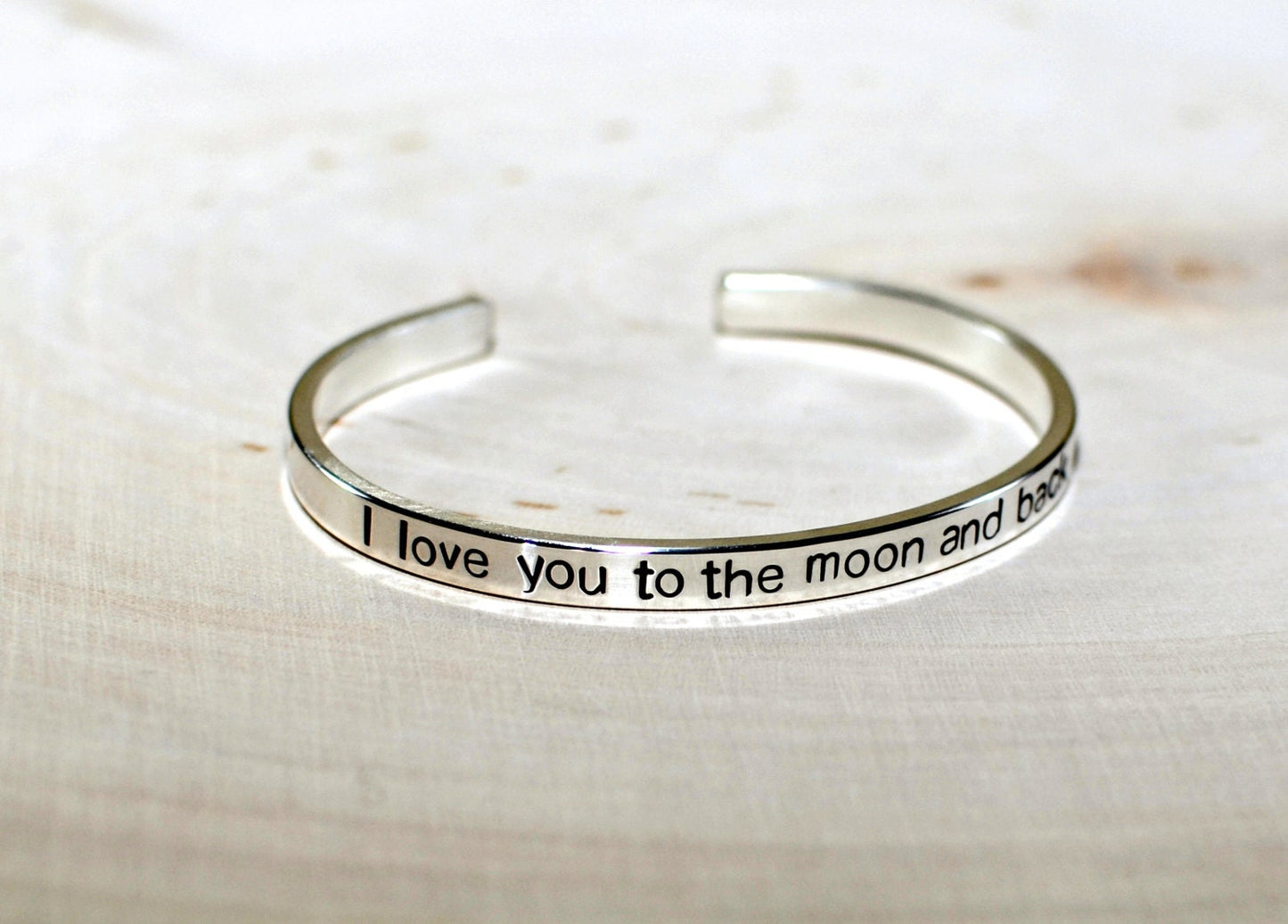 Sterling silver bracelet stamped to the moon and back