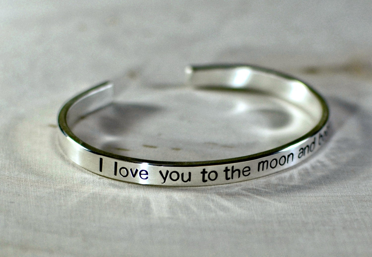 Sterling silver bracelet stamped to the moon and back