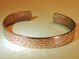 Copper cuff bracelet with hammered swirl design, NiciArt 