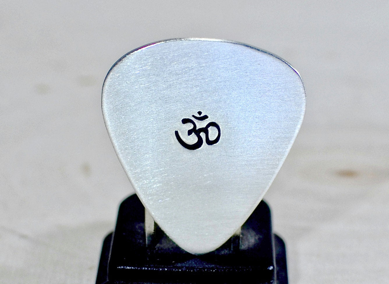 OM Sterling silver guitar pick