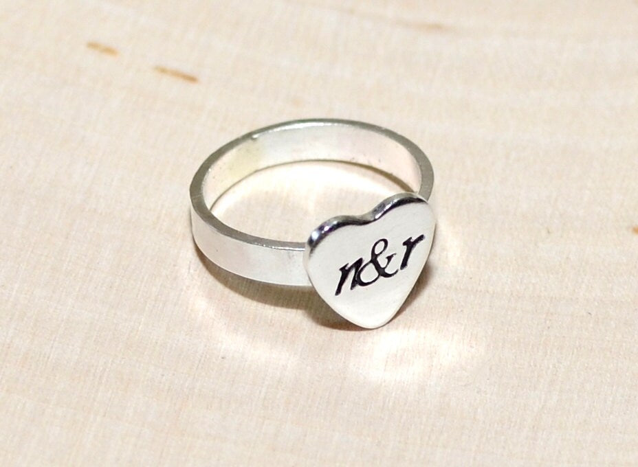 Heart ring with sterling silver band and personalized heart