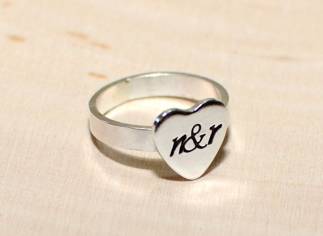 Heart ring with sterling silver band and personalized heart
