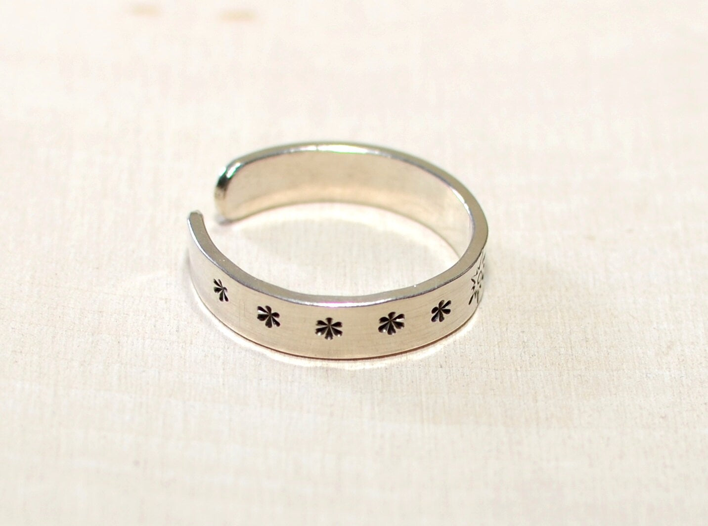 Sterling silver toe ring with sunburst and stars