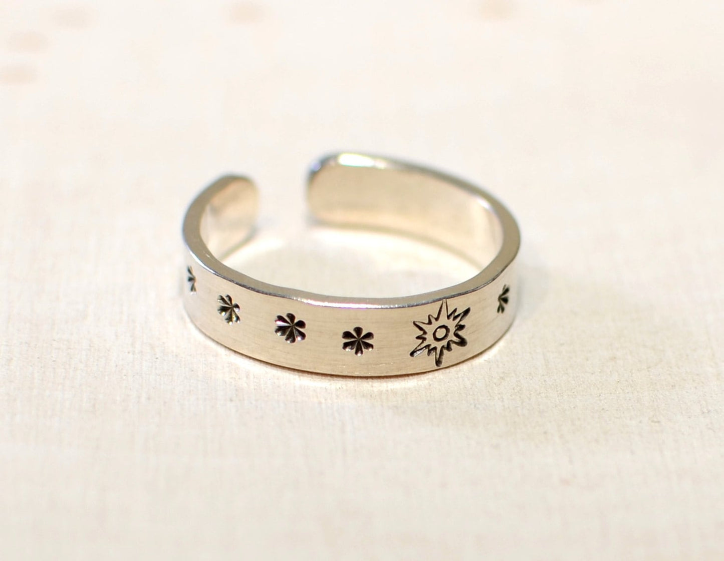 Sterling silver toe ring with sunburst and stars