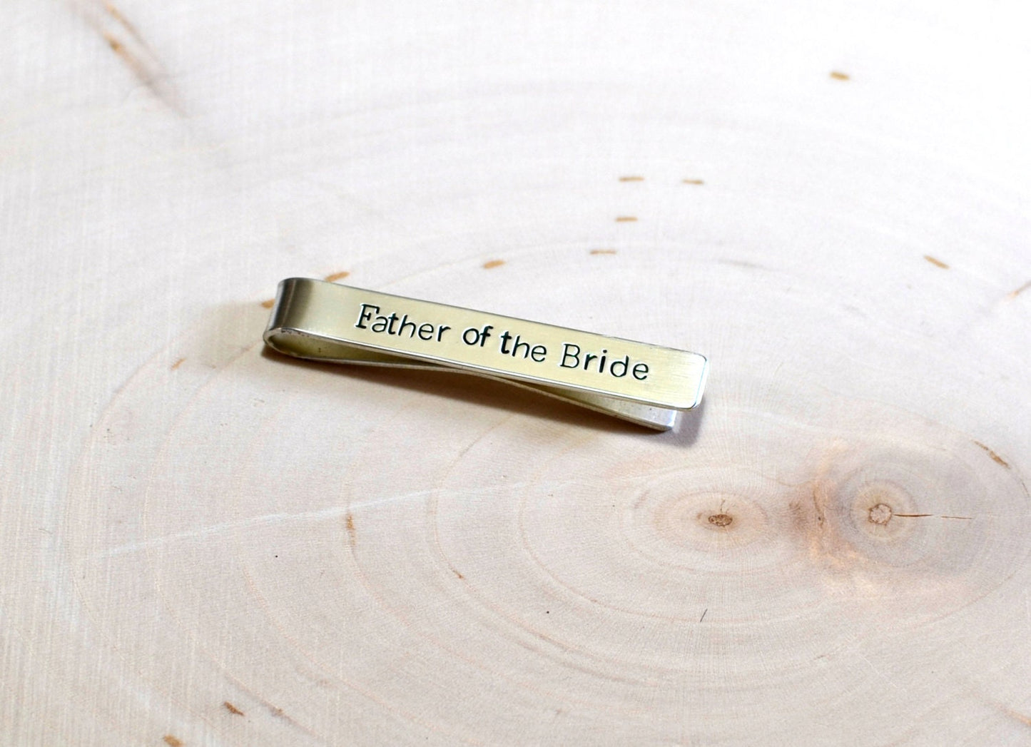 Father of the bride on a sterling silver tie clip