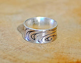 Sterling silver anticlastic ring handmade with swirling pattern, NiciArt 