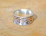 Sterling silver anticlastic ring handmade with swirling pattern, NiciArt 