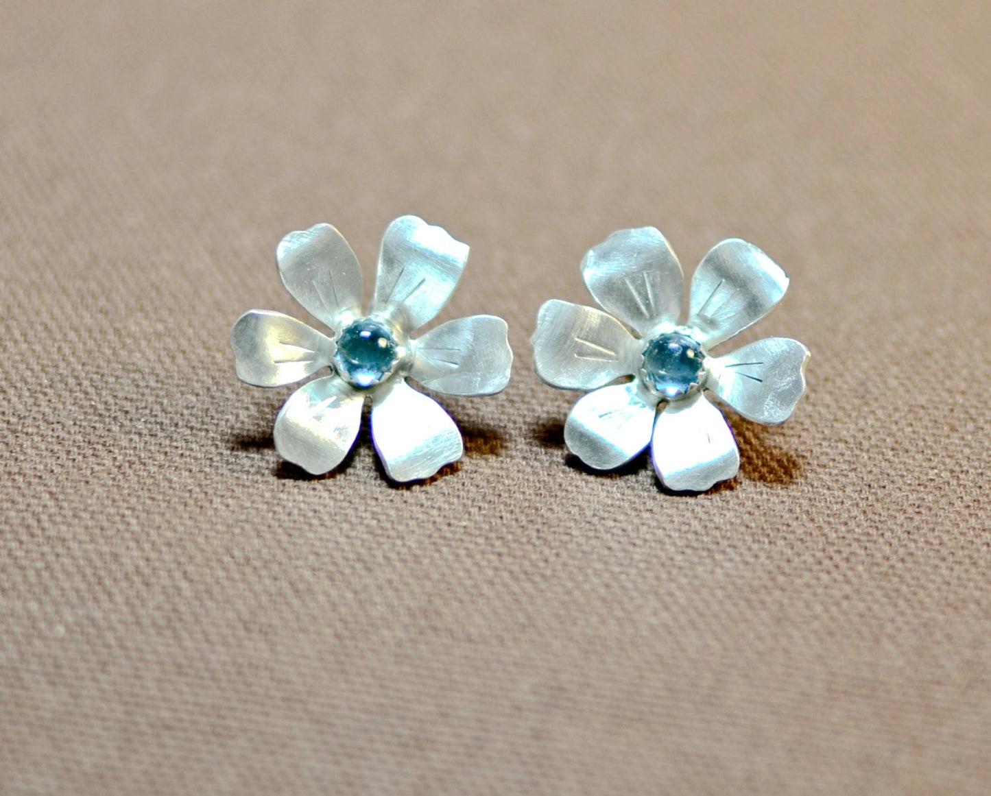 Sterling silver handcrafted flower earrings with blue topaz