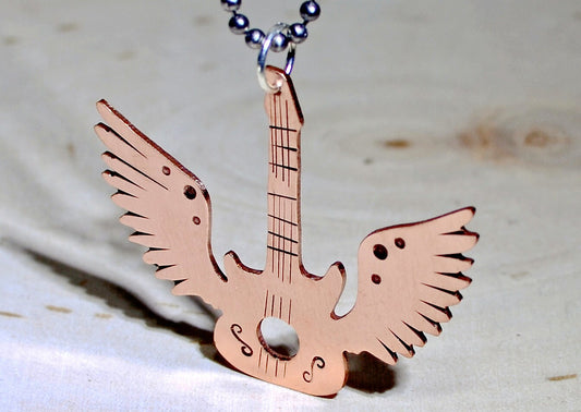 Copper winged guitar necklace