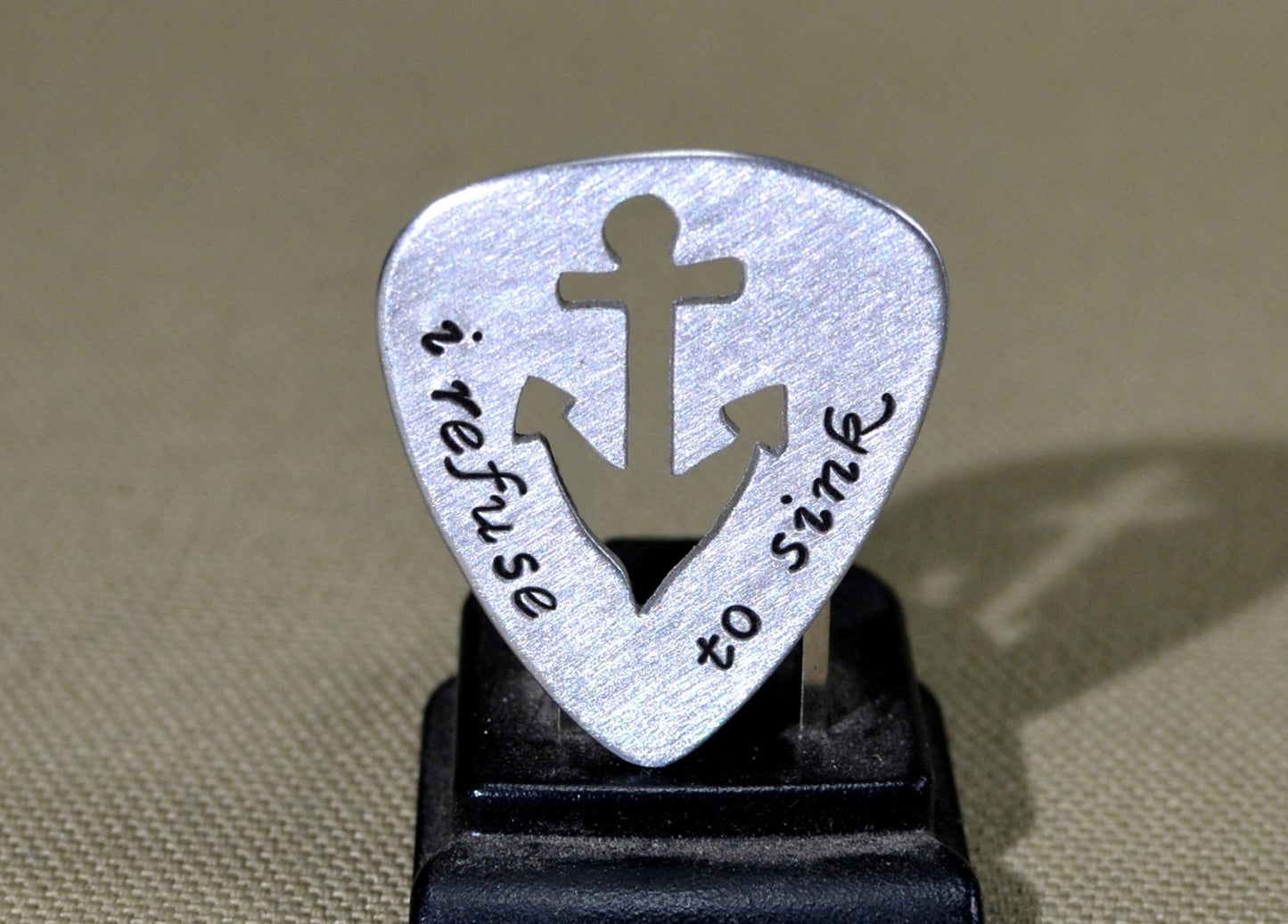 Sterling silver guitar pick with anchor theme
