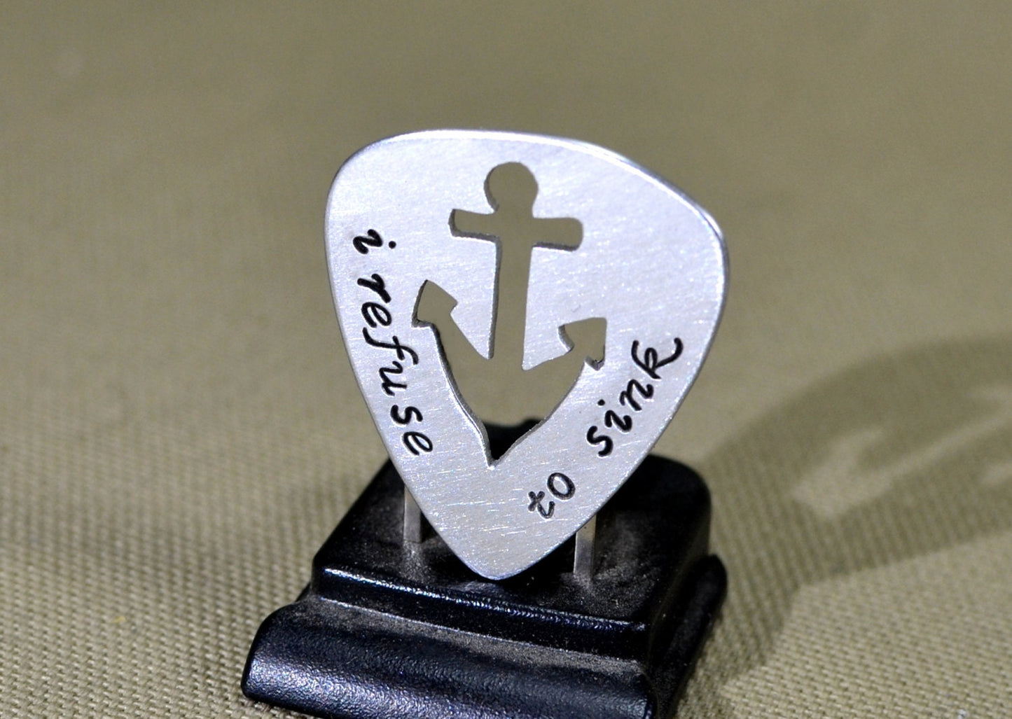Sterling silver guitar pick with anchor theme