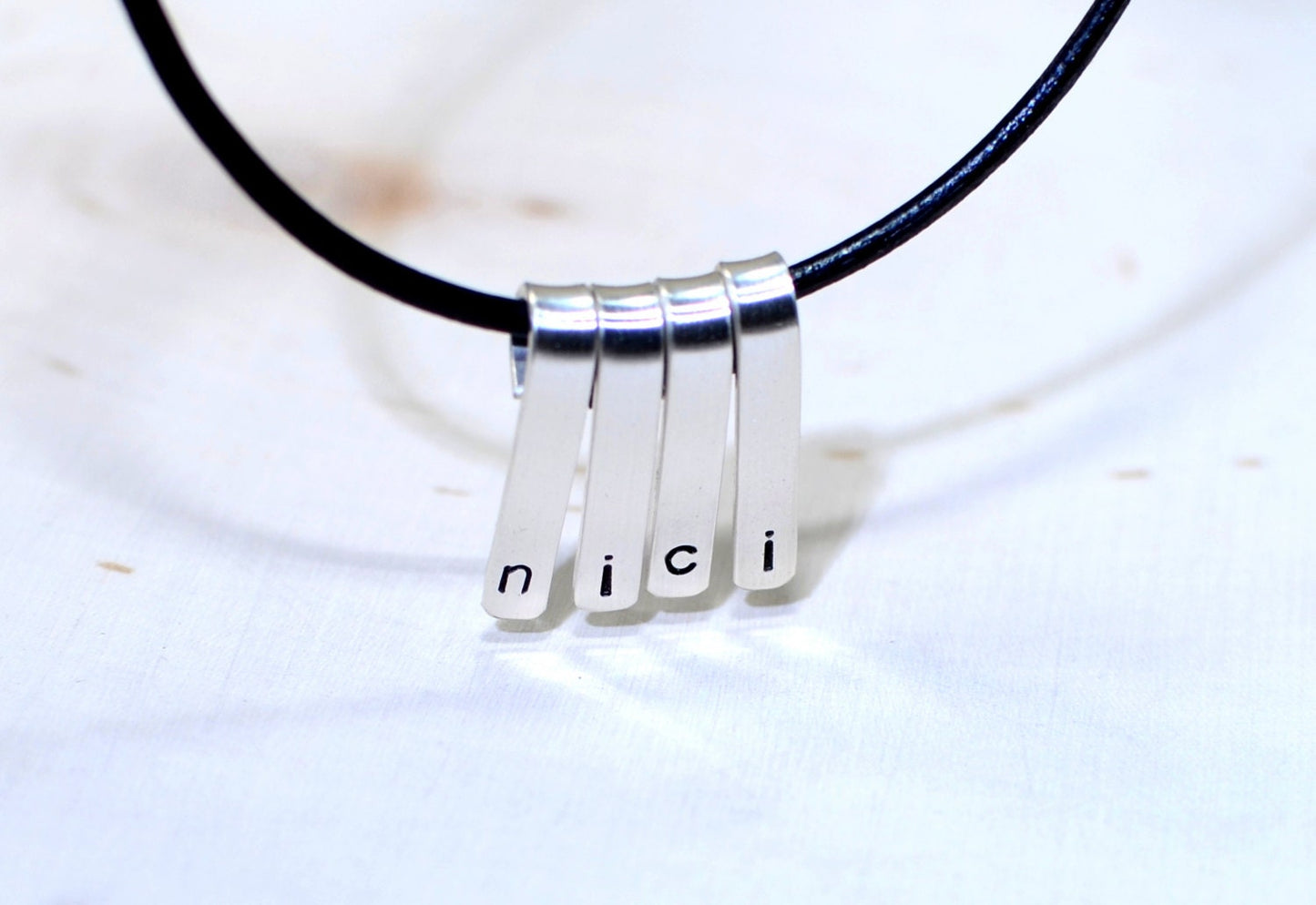 Sterling silver personalized bars on a necklace