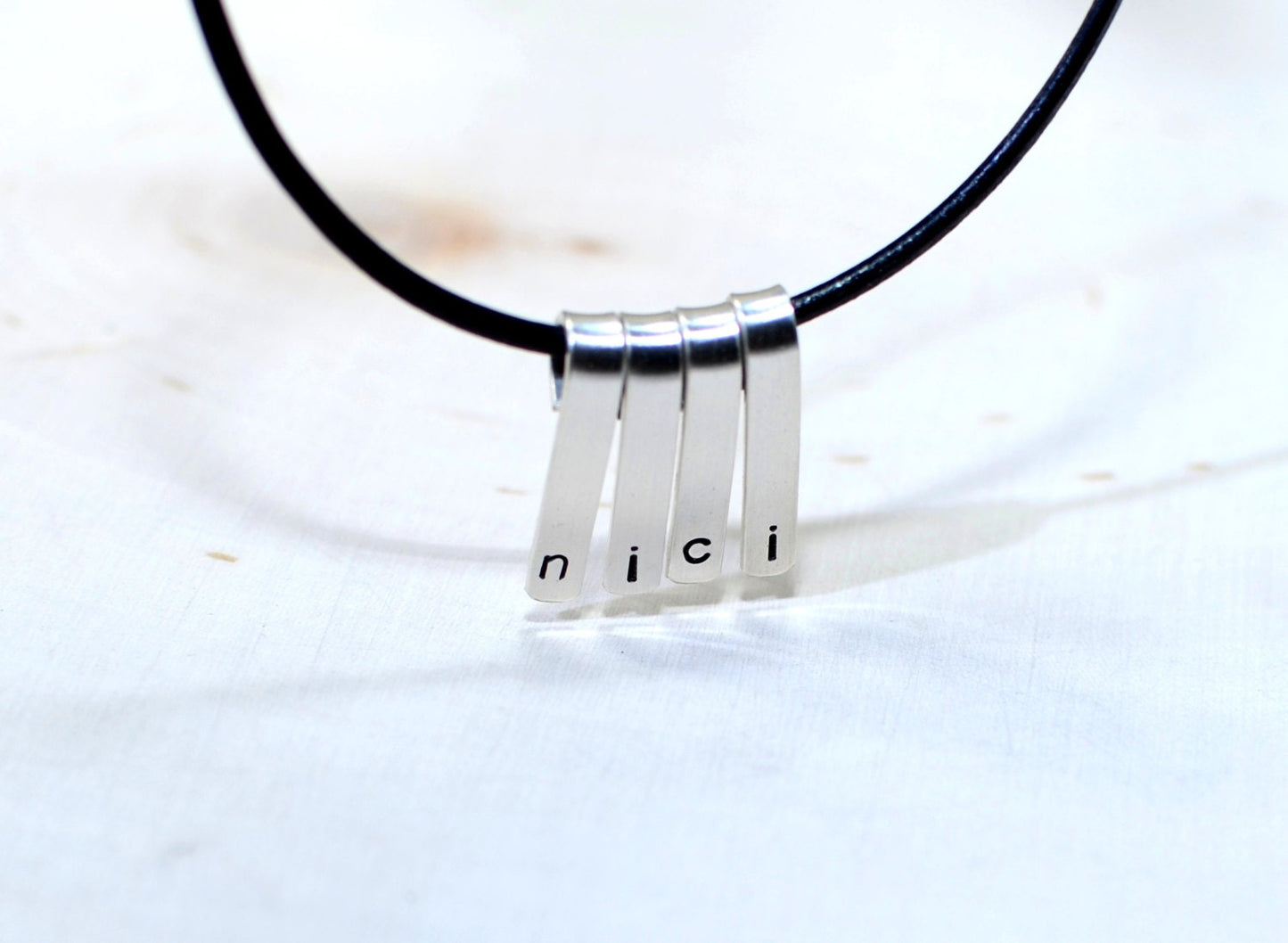 Sterling silver personalized bars on a necklace