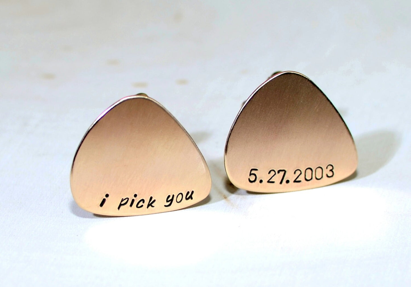 Bronze guitar pick cuff links engraved with I Pick You and wedding date