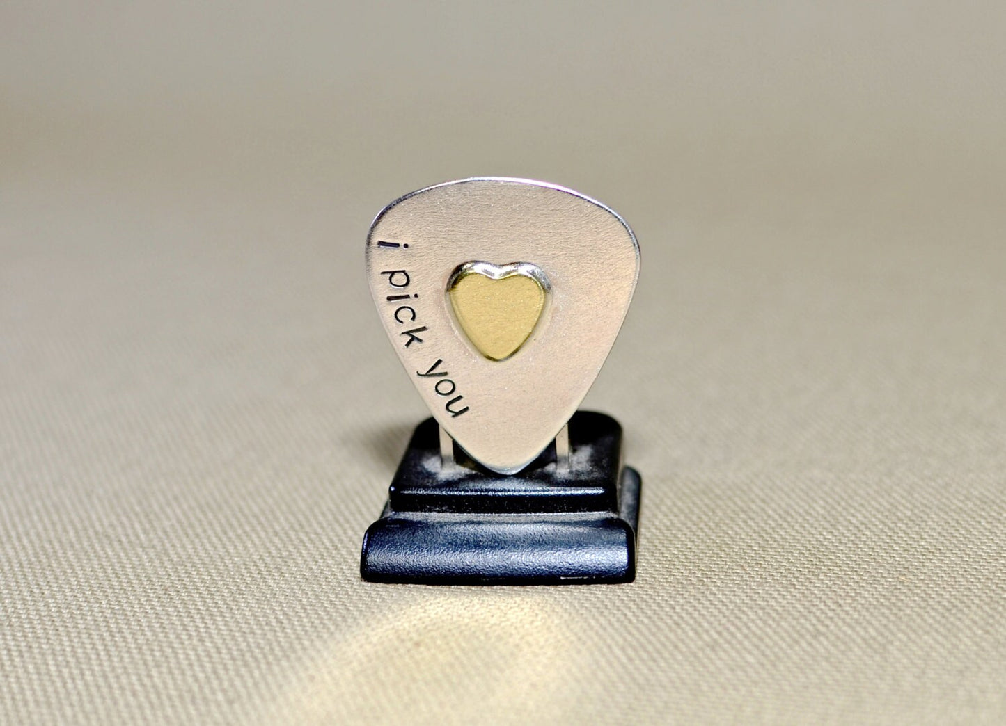 Sterling silver guitar pick and brass heart handcrafted with love