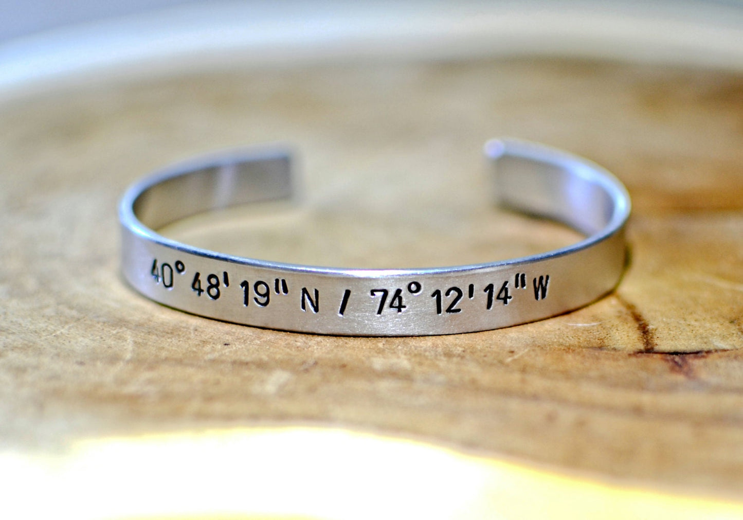 Latitude longitude personalized coordinates in aluminum cuff bracelet