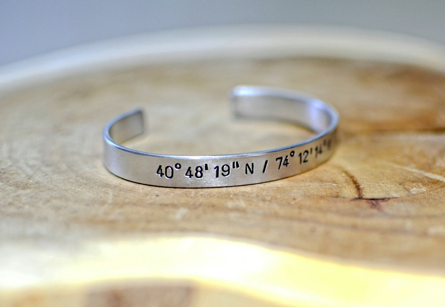 Latitude longitude personalized coordinates in aluminum cuff bracelet