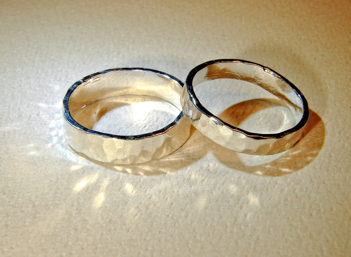 Hammered sterling silver ring set or weddings bands with the ability to customize