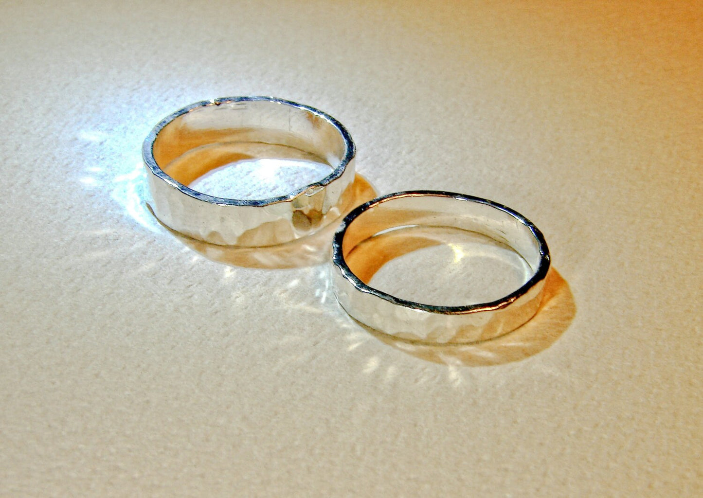 Hammered sterling silver ring set or weddings bands with the ability to customize