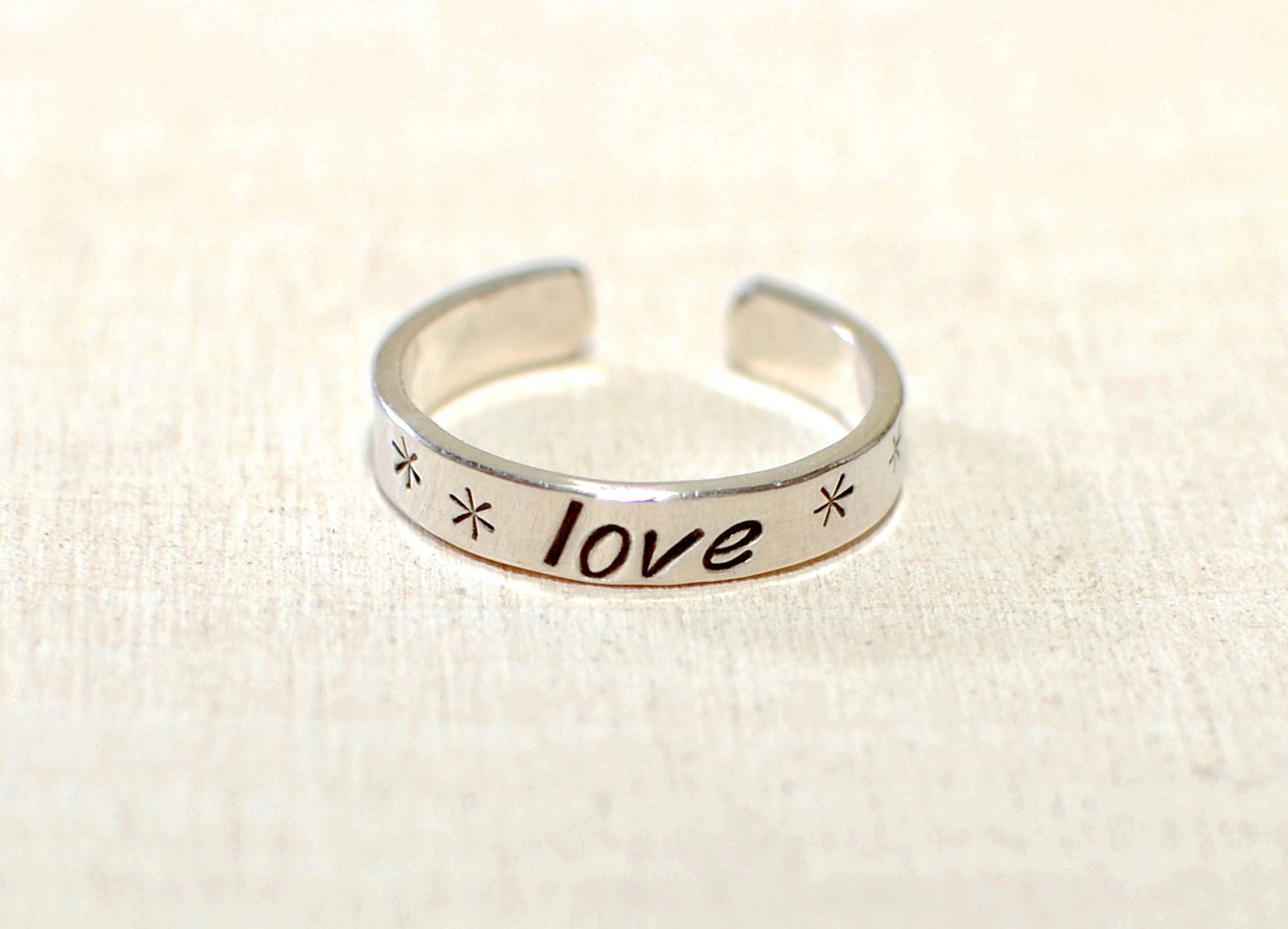 Narrow style dainty toe ring in sterling silver with love