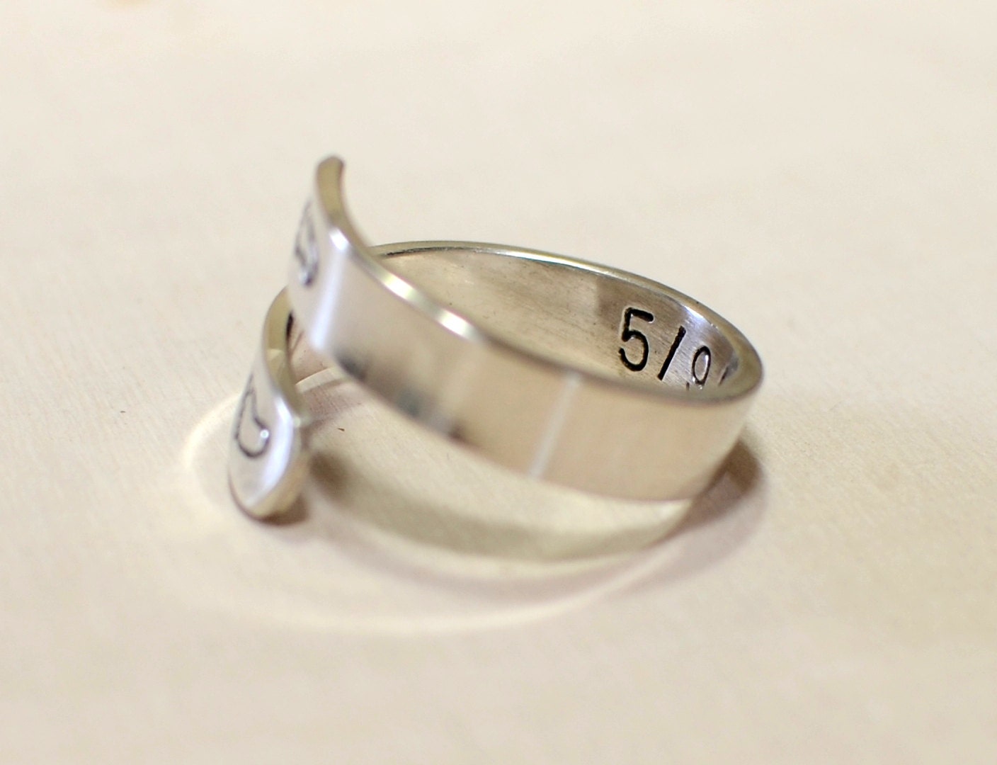 Sterling silver ring for a new mom with babyfeet and birth date
