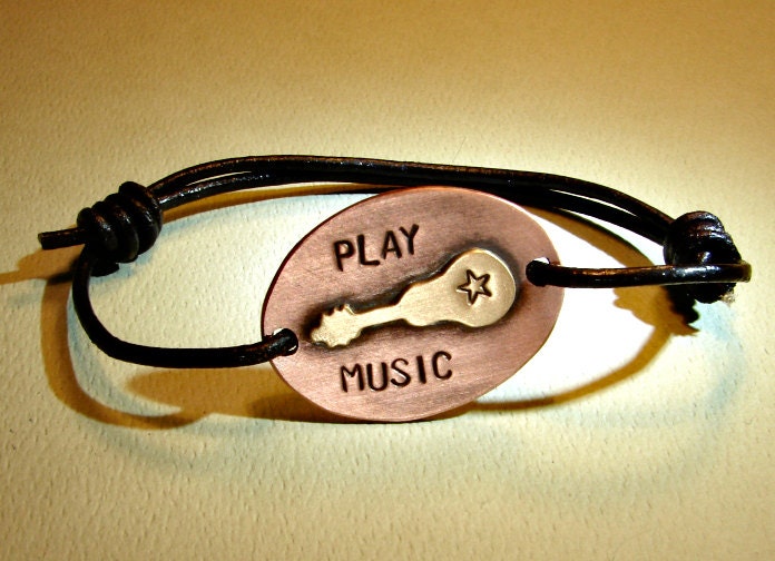 Guitar wrap bracelet with black leather cord