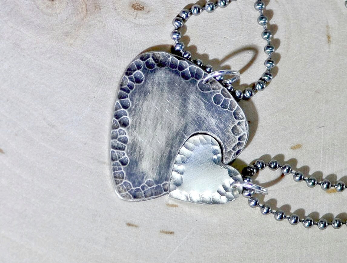 Sterling silver guitar pick and heart couples necklace