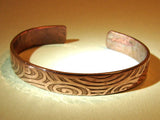 Copper cuff bracelet with hammered swirl design, NiciArt 