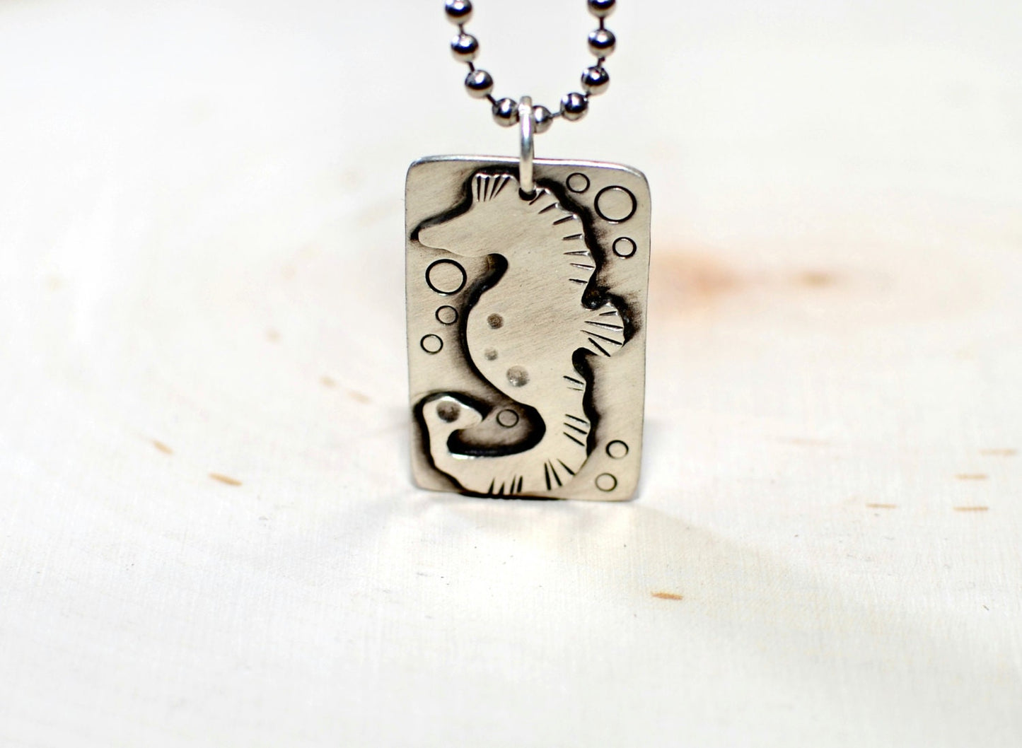 Handcrafted seahorse on sterling silver necklace