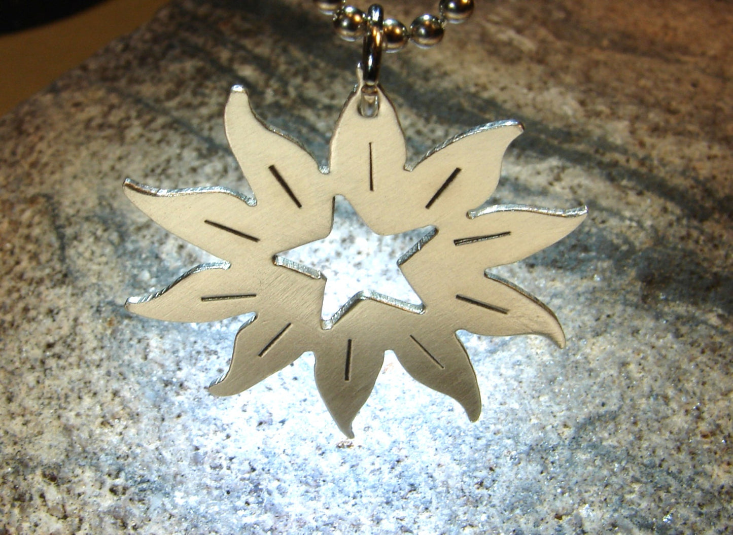 Sterling silver sun with a star handcrafted artistic necklace