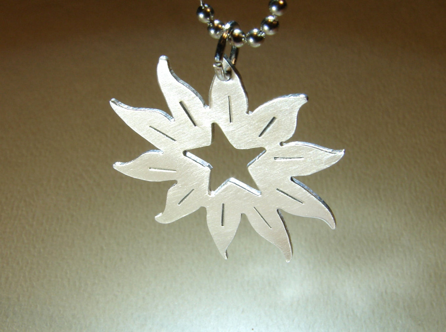 Sterling silver sun with a star handcrafted artistic necklace
