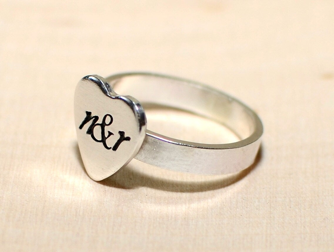 Heart ring with sterling silver band and personalized heart