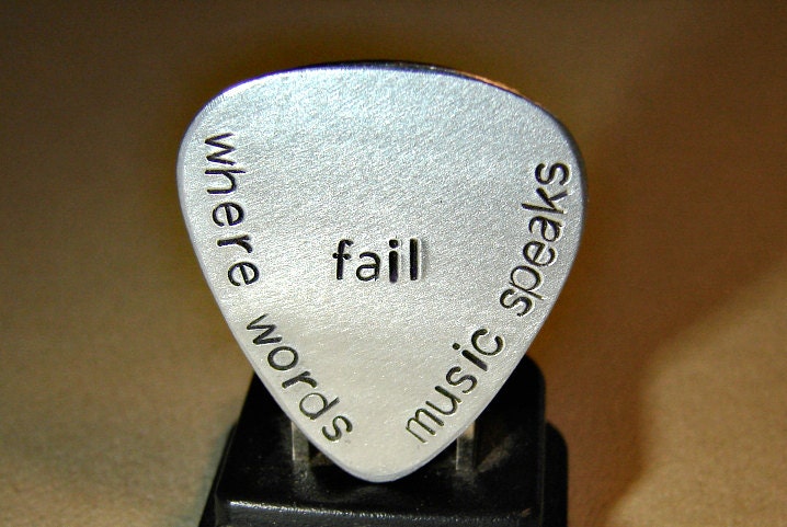 Where words fail music speaks aluminum guitar pick