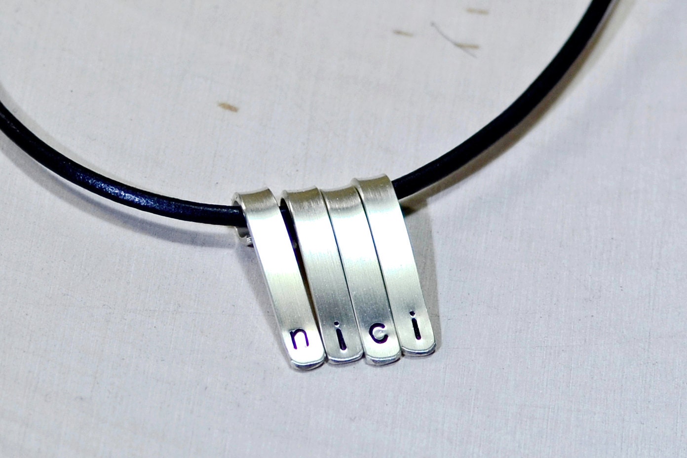 Sterling silver personalized bars on a necklace