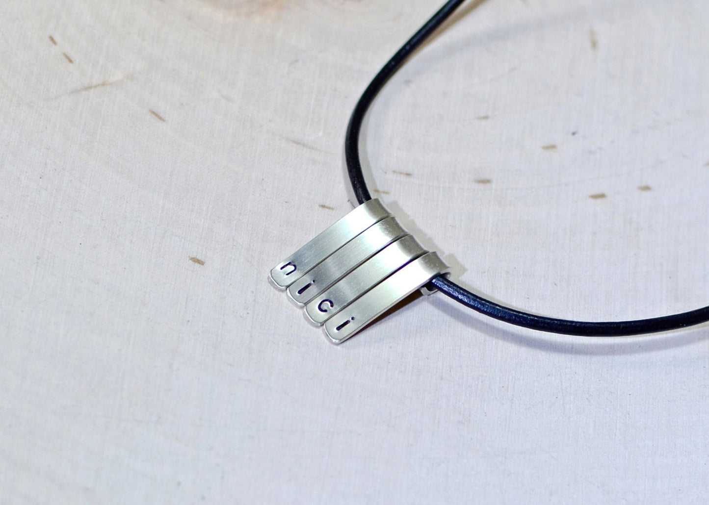 Sterling silver personalized bars on a necklace