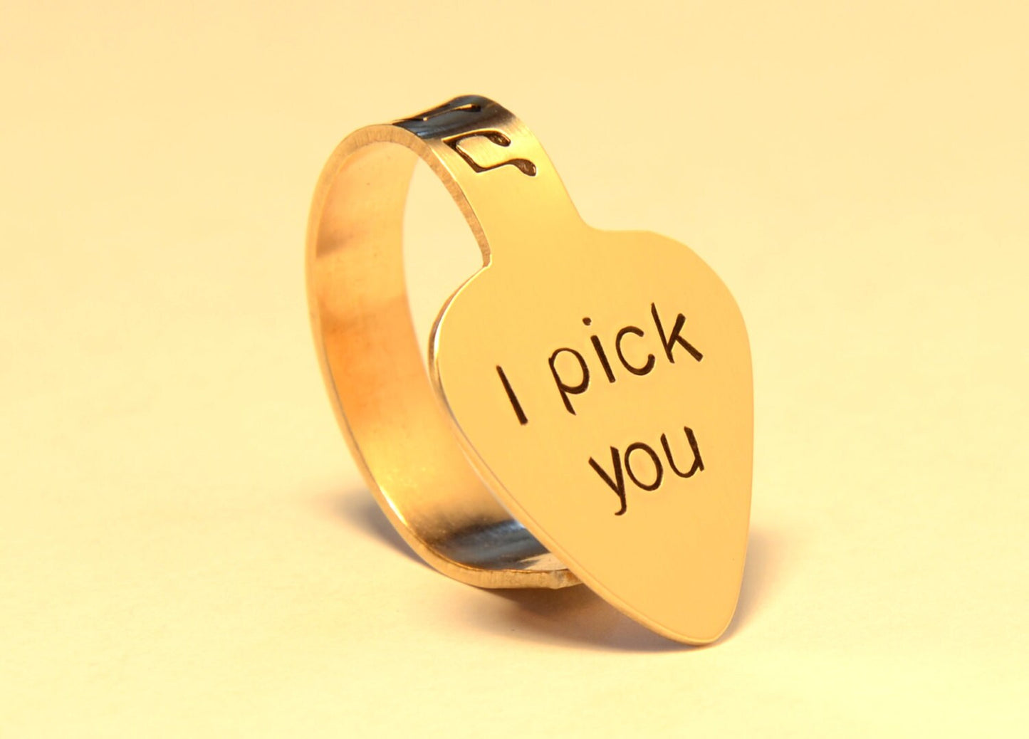 Bronze thumb guitar pick with I pick you