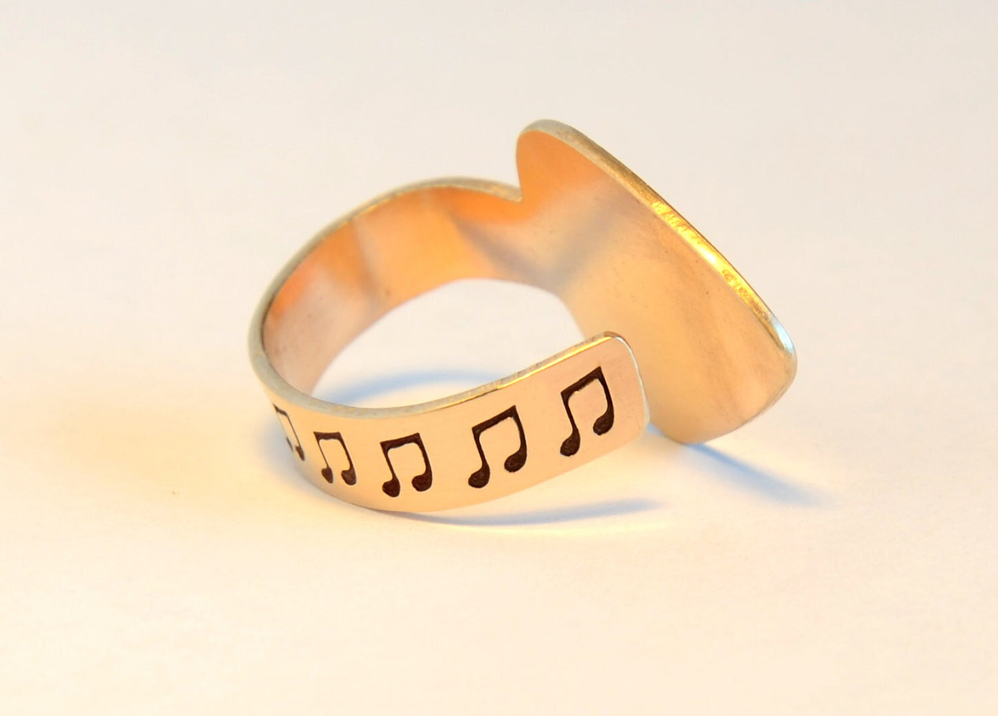 Bronze thumb guitar pick with I pick you