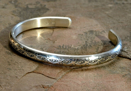 Half Round Cuff Bracelet in Sterling Silver imprinted using Handmade Native American Metal Stamps