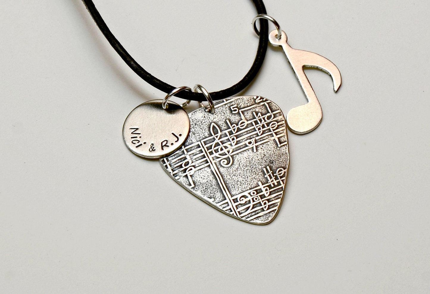Sterling Silver Necklace Guitar Pick with a Music Note and Personalized Disc