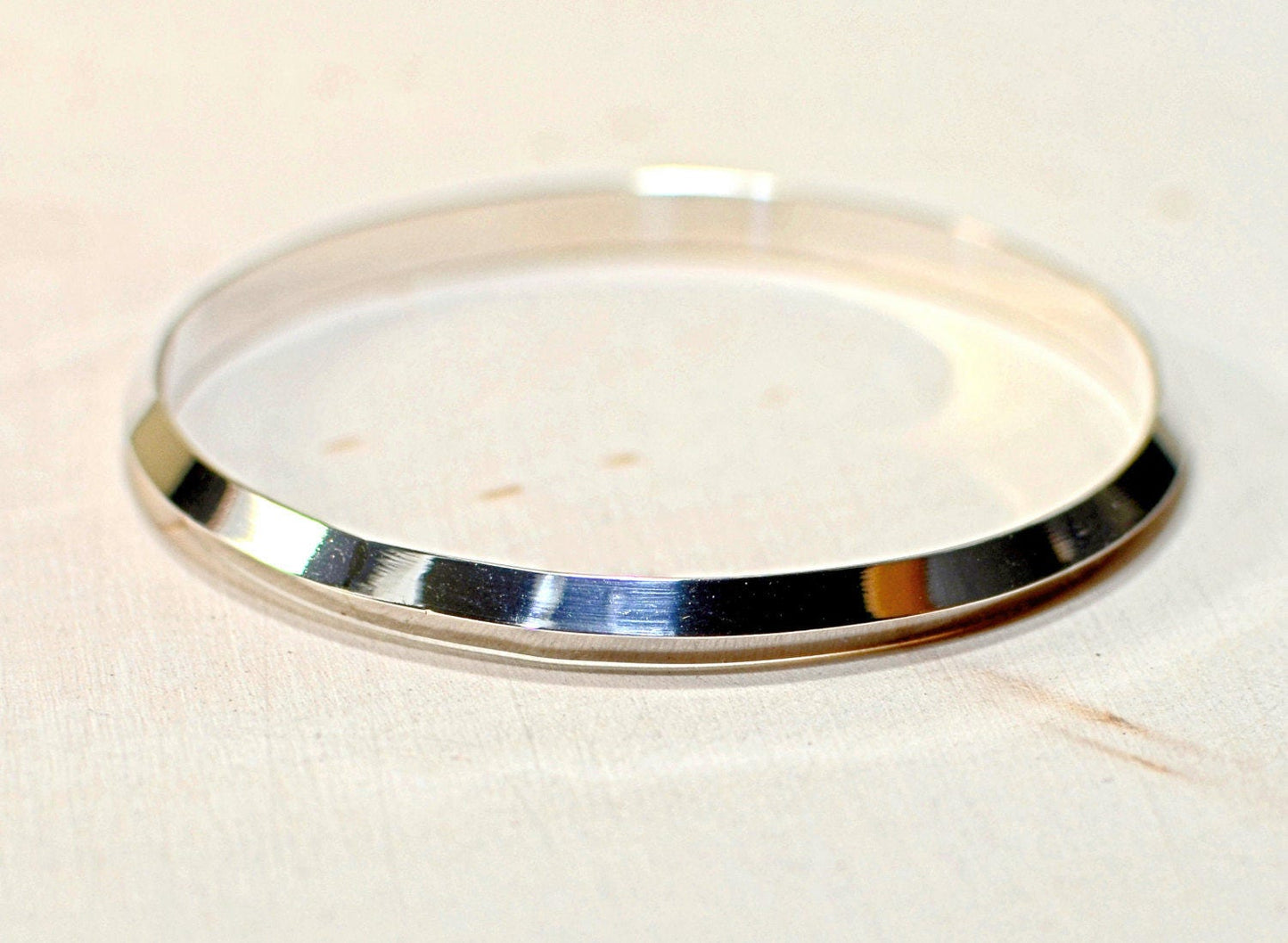Triangular wire sterling silver bangle