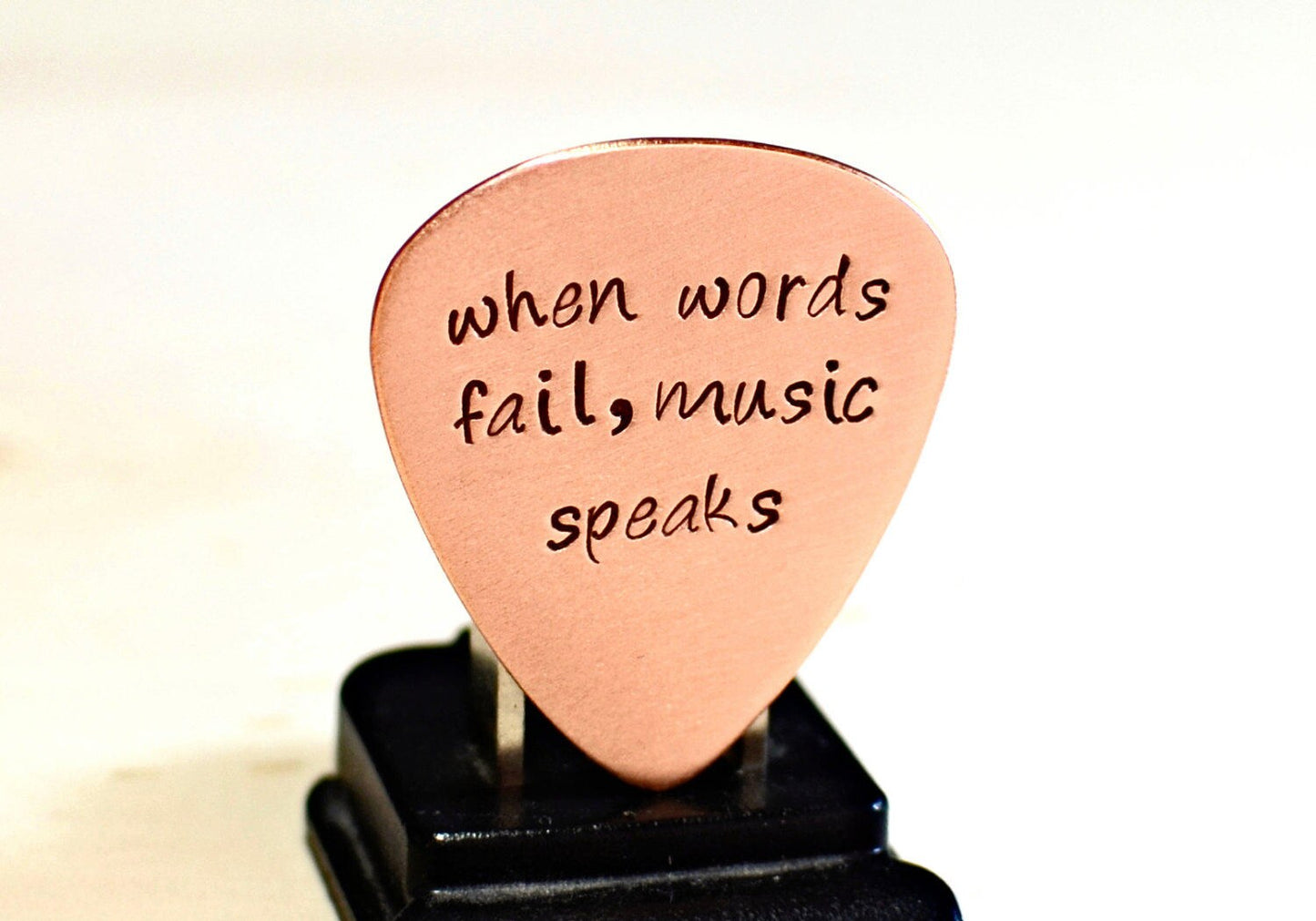 When Words Fail Music Speaks copper guitar pick