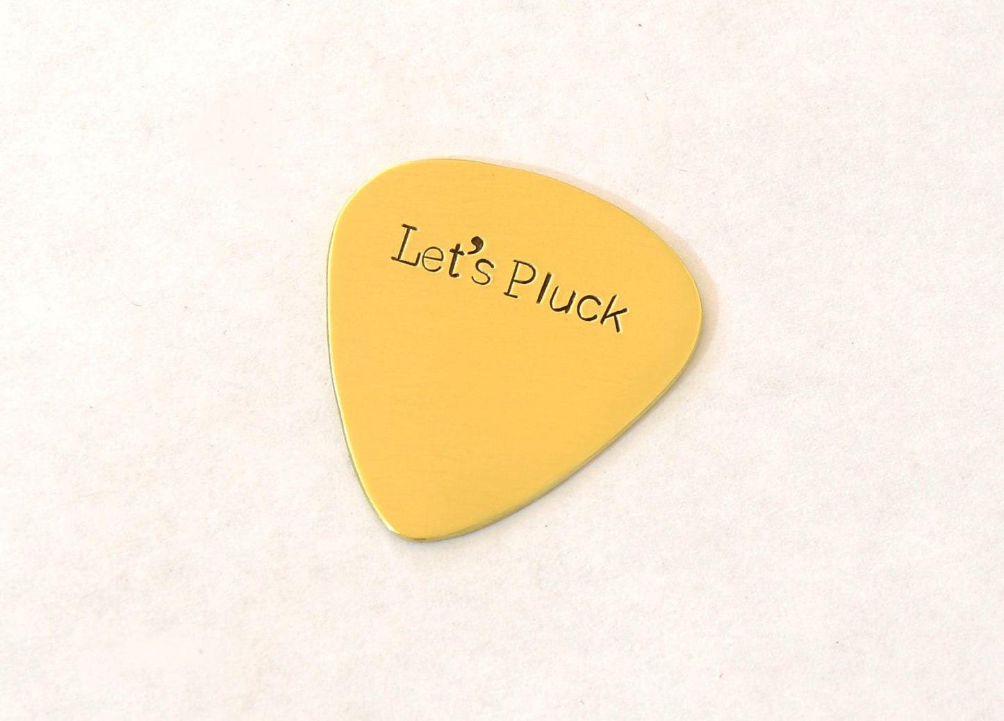 Let’s Pluck brass guitar pick