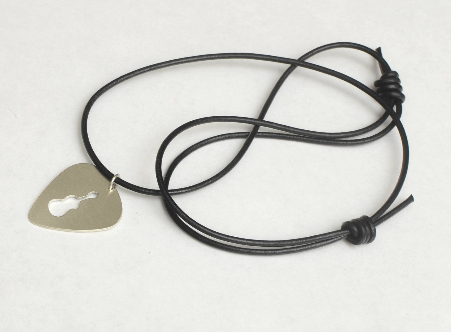 Bronze Guitar Pick Necklace with cutout Guitar Design